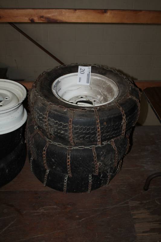 lot 20 image: Celebrity P22575R15 Tires with 15in. Wheels, Tire Chains