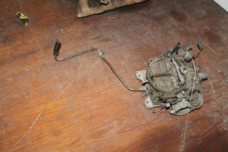 lot 44 image: Quadrajet Carburetor with Linkage