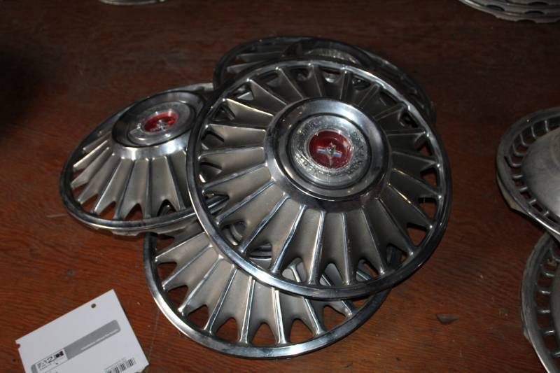 lot 70 image: Ford Mustang Wheel Hubcaps