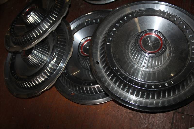 lot 66 image: Ford Thunderbird Wheel Hubcaps