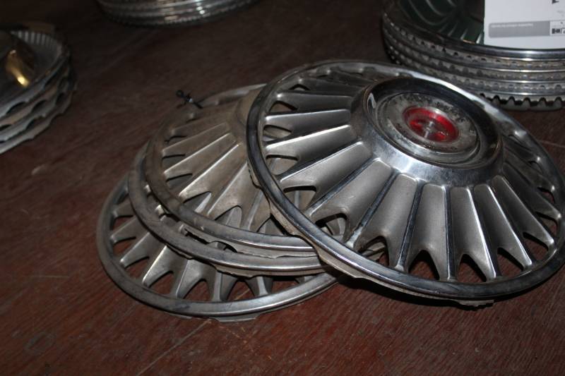 lot 62 image: Ford Mustang Wheel Hubcaps