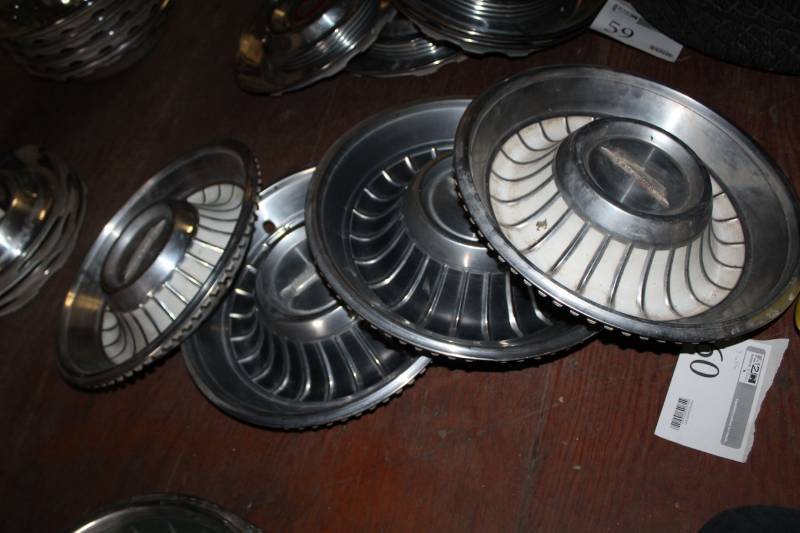 lot 60 image: Cadillac Wheel Hubcaps