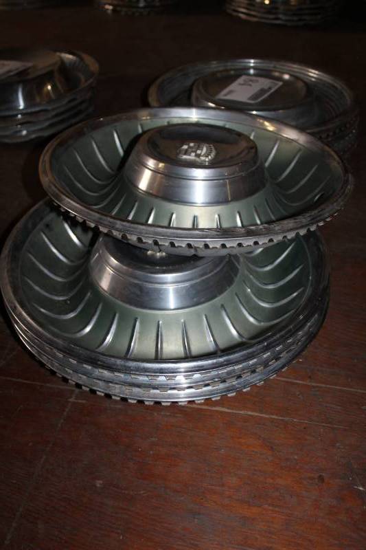 lot 61 image: Cadillac Wheel Hubcaps