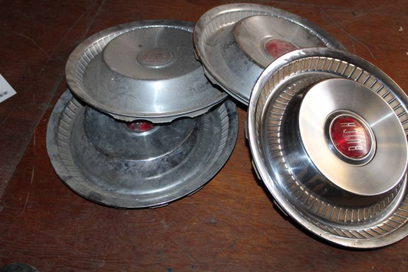 lot 76 image: Buick Wheel Hubcaps