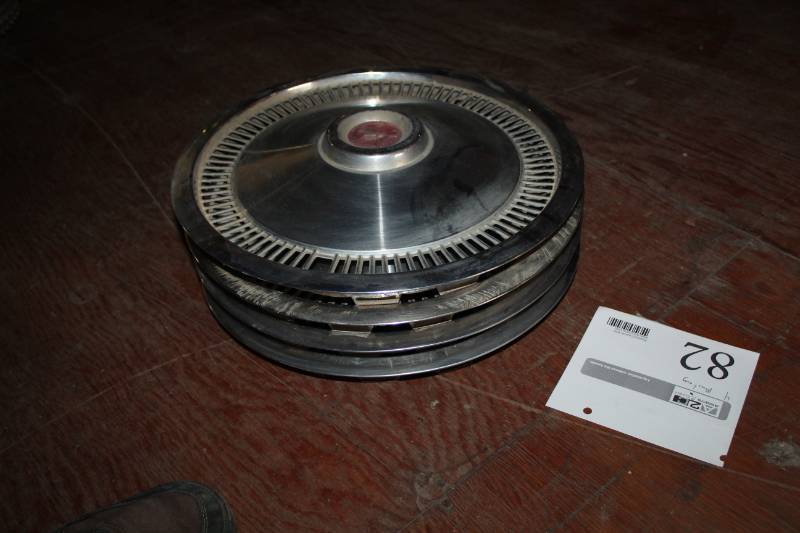 lot 82 image: Ford Mustang Wheel Hubcaps