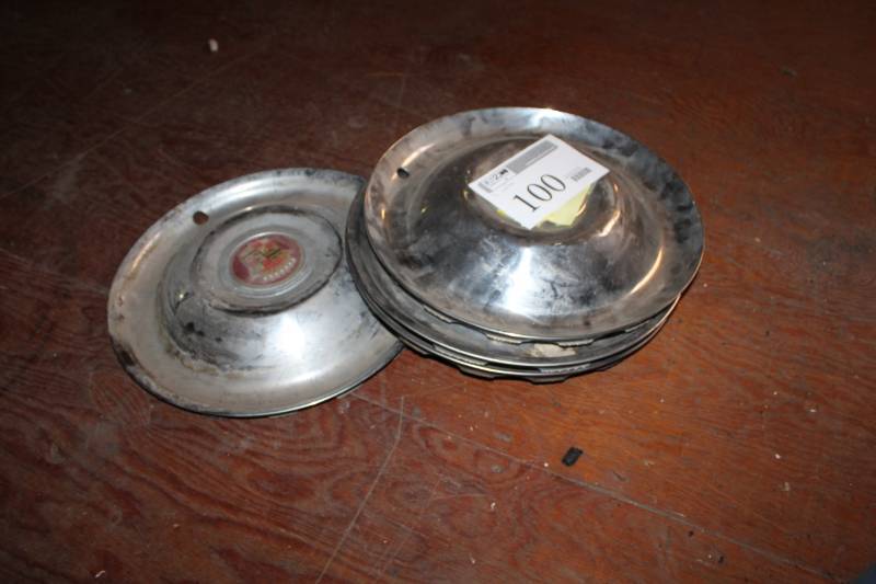 lot 100 image: Cadillac Wheel Hubcaps