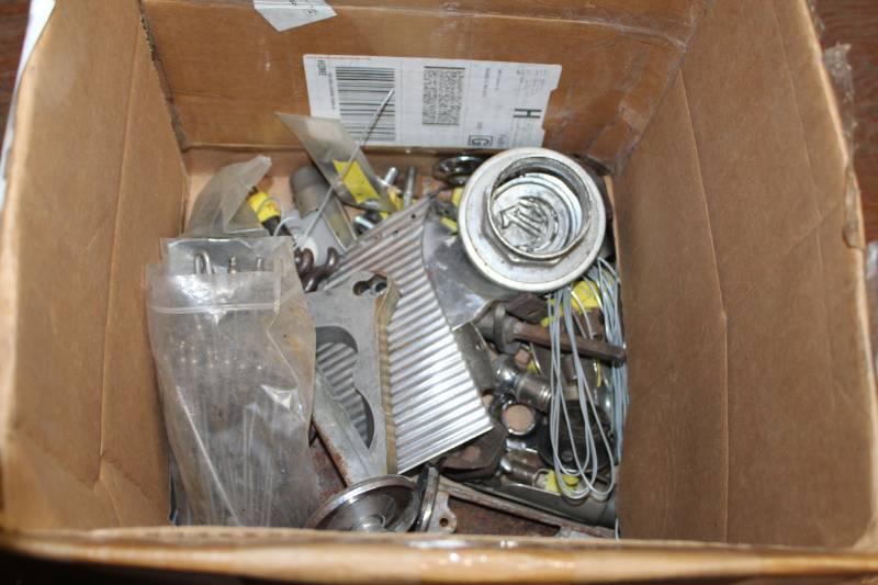lot 148 image: Replacement Spokes, Hood Hold Downs, Ash Tray, Center Cap, Mr. Gasket Manifold Riser, And More