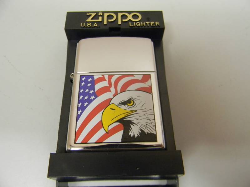 lot 50 image: NOS STILL IN THE BOX FLAGEAGLE ZIPPO LIGHTER - SEE PICTURES