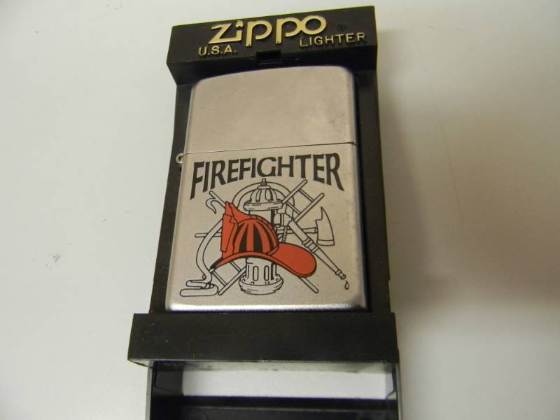 lot 57 image: NOS STILL IN THE BOX FROM FIREFIGHTER ZIPPO LIGHTER - SEE PICTURES