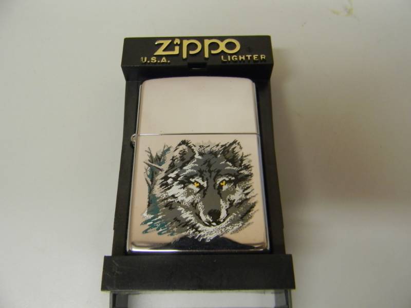 lot 59 image: NOS STILL IN THE BOX WOLF ZIPPO LIGHTER - SEE PICTURES