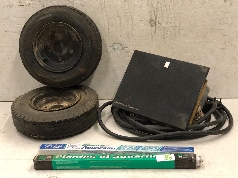 lot 98 image: (2) 24 Light Bulbs, (2) Trailer Wheels & Tires, Electrical Control Center