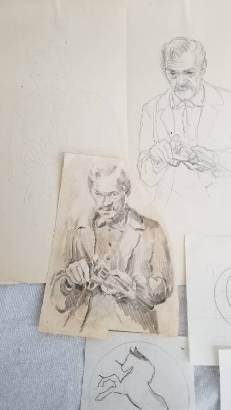 lot 60 image: Original 1950s Les Anderson Colt and Winchester Pre Ad Drawings