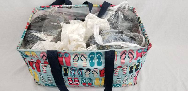 lot 89 image: Lot of Fabric Swatches, Levi Jean Pockets and Nice Carry Bag
