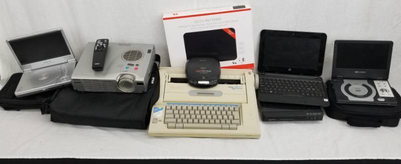 lot 115 image: Lot of Electronics, Portable DVD, Movie Projector, Typewriter, Laptop, Etc.