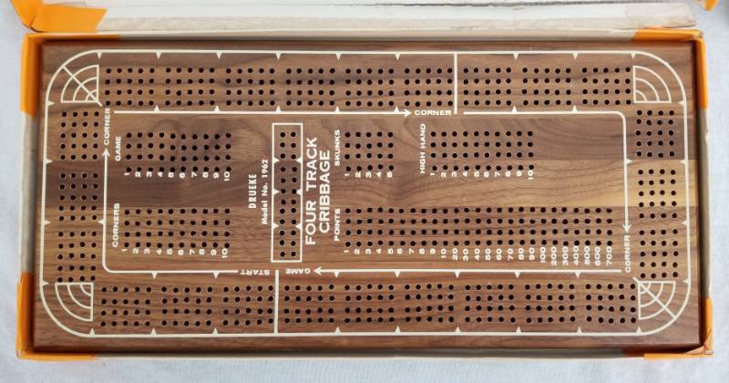 lot 110 image: Lot of Vintage Cribage Boards, Cards, Dice, Puzzles, Etc.