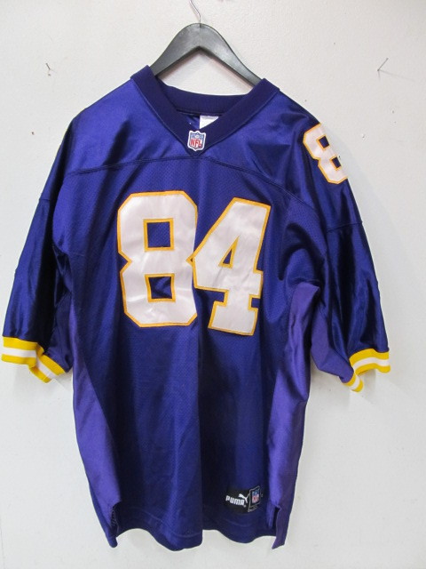 lot 28 image: Nice Condition Puma RANDY MOSS Vikings Jersey - Size 54
