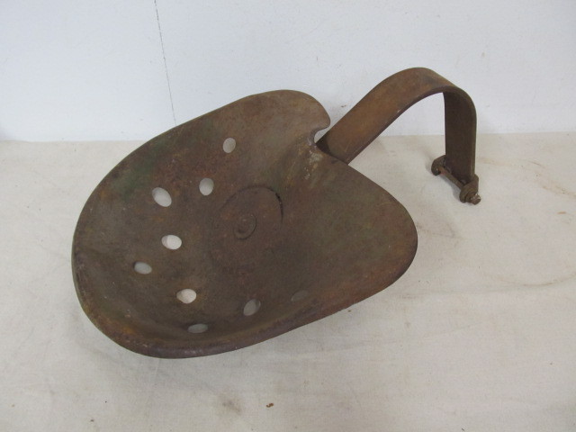 lot 65 image: Antique Metal Tractor Seat