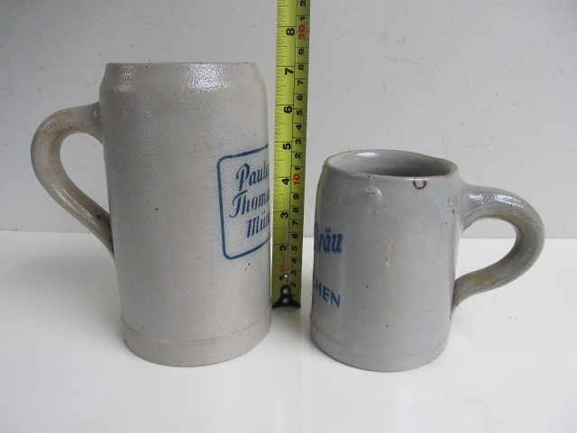 lot 110 image: 2 Old Vintage Stoneware German Advertising Beer Mugs