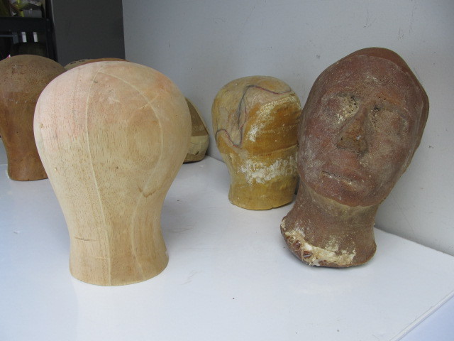 lot 145 image: Large Lot of Vintage & Antique Hat Block Head Forms
