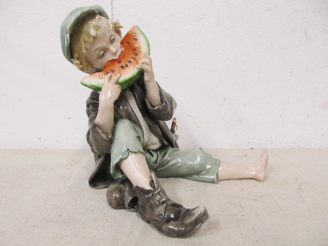 lot 177 image: Signed Vintage 1960 GIUSEPPE CAPPE Capodimonte Boy Eating Watermelon Figurine
