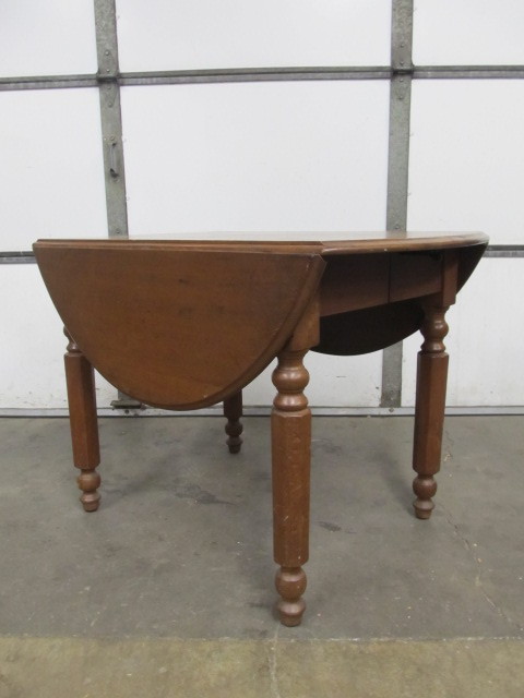 lot 203 image: Antique Drop Leaf Folding Oval Dining Table