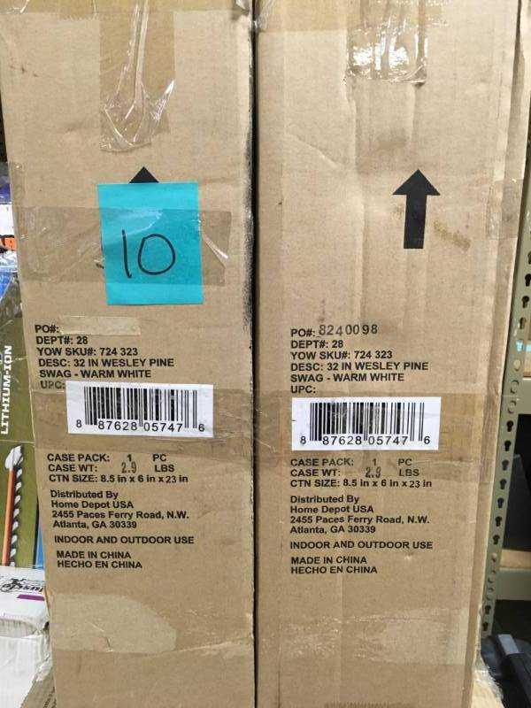 lot 10 image: Yow 32 in. Pre-Lit LED Wesley Pine Swag x 133 Tips with 35 Plug-in IndoorOutdoor Warm White LED Lights 2 CASES not used