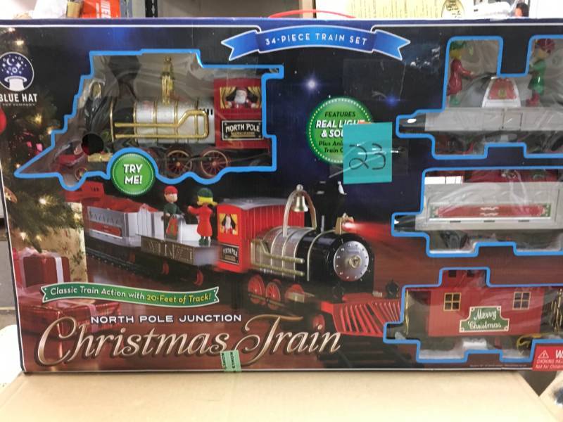 blue hat north pole junction christmas train