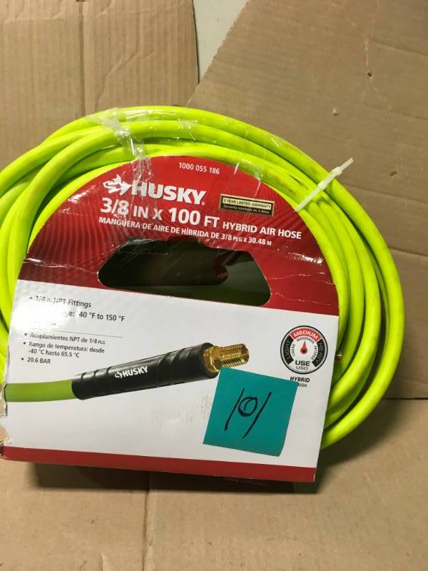lot 101 image: Husky 38 in. x 100 ft. Hybrid Air Hose in good condition
