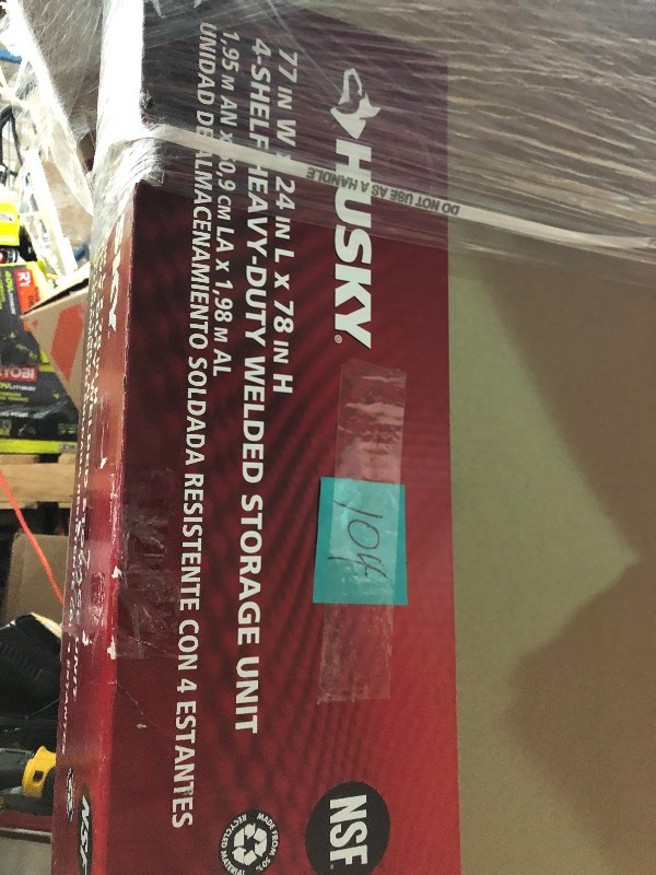 lot 104 image: Husky 77 in. W x 78 in. H x 24 in. D Steel Garage Storage Shelving Unit NOT USED