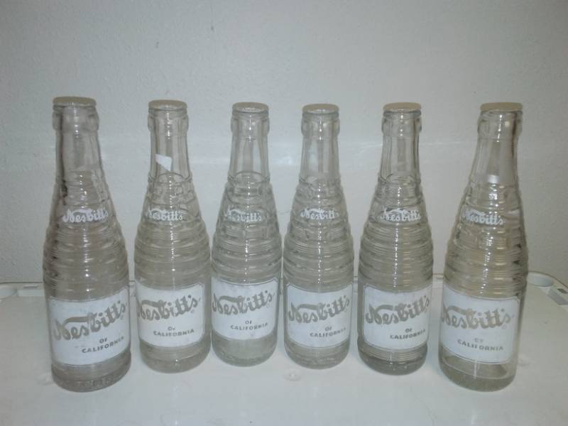 lot 19 image: 21 Collectible Soda pop Bottles