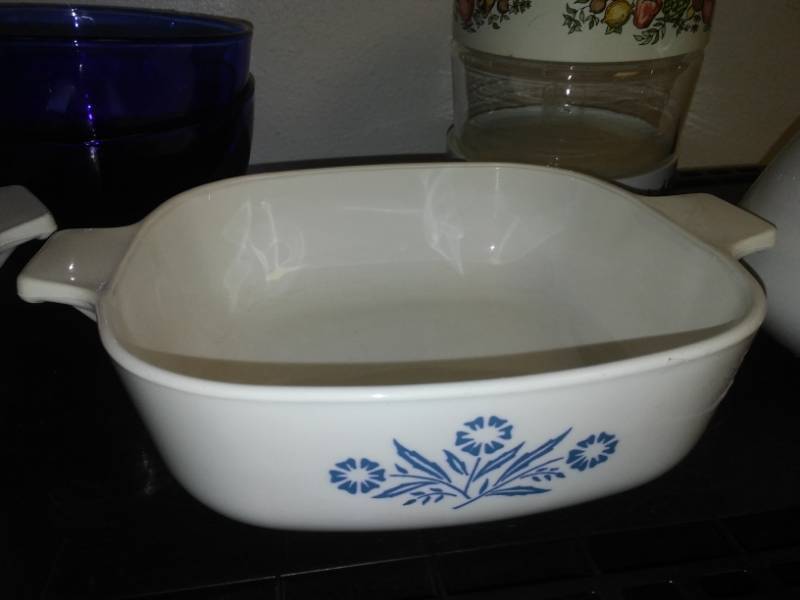 lot 12 image: Corning Ware, Wicker Trays and More