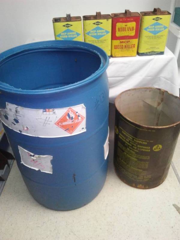 lot 21 image: 5 cans and plastic barrel civil defense can.