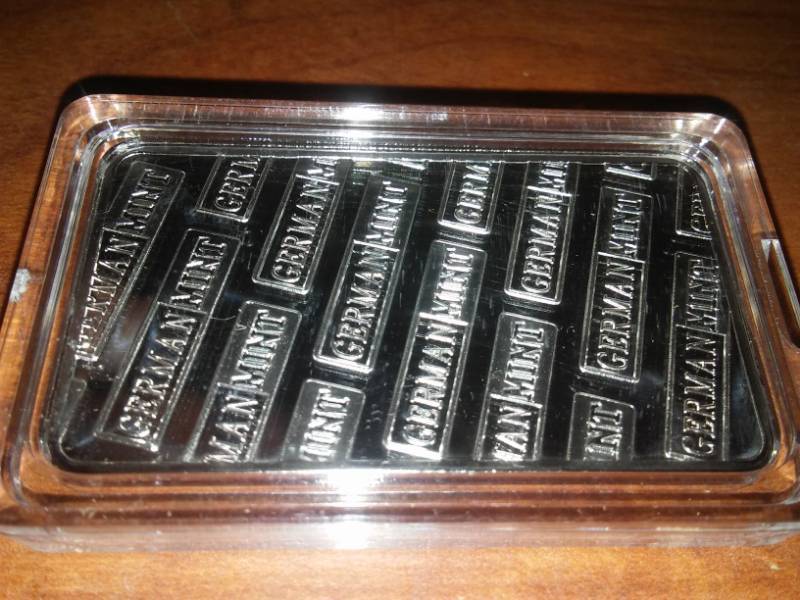 lot 56 image: NDSU Bison silver one troy ounce German silver bullion.