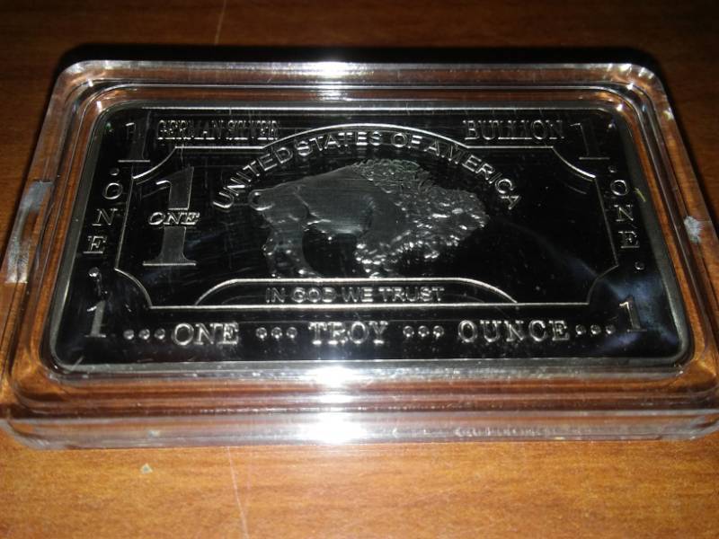lot 54 image: NDSU Bison silver one troy ounce German silver bullion.