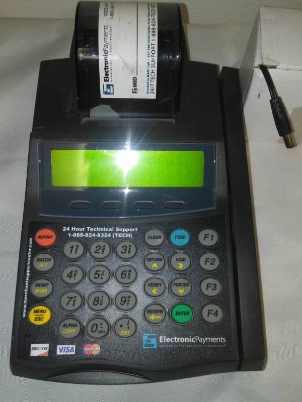 lot 86 image: Credit card processor - new power supply.