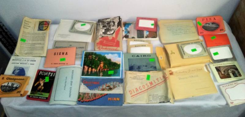 lot 131 image: 26 photo packets from around the world, antique and vintage.