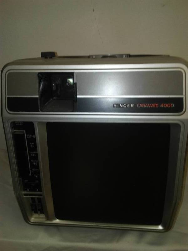 lot 147 image: Singer Caramate 4000. All-in-one slide projector.