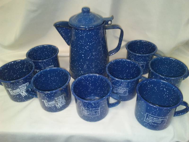 lot 167 image: Jack Daniels Blue enamel speckle Ware coffee pot and 8 cups.