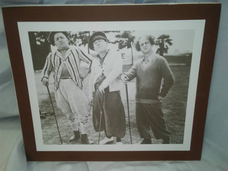 lot 198 image: Three Stooges print - golf theme