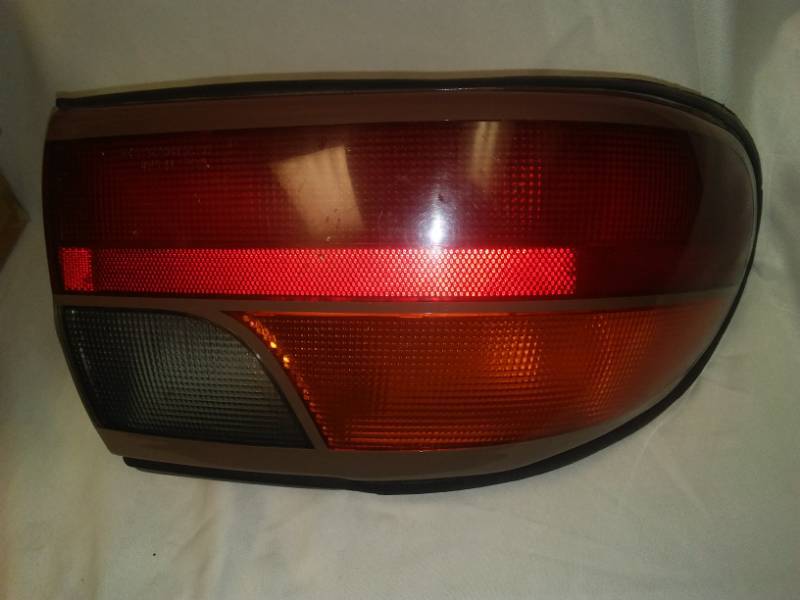 lot 236 image: 2005 Chevy Malibu tail light.
