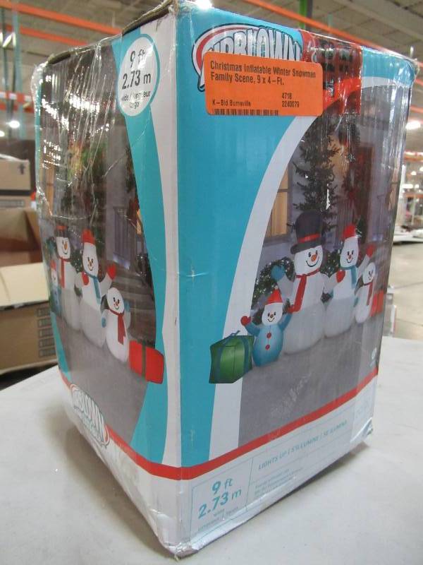 lot 47 image: Gemmy Christmas Inflatable Winter Snowman Family Scene, 9 x 4-Ft.