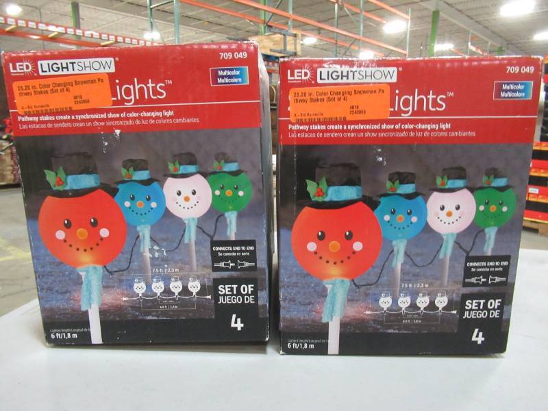 lot 133 image: 2 Boxes of LightShow 25.20 in. Color Changing Snowman Pathway Stakes (Set of 4Box) 10307