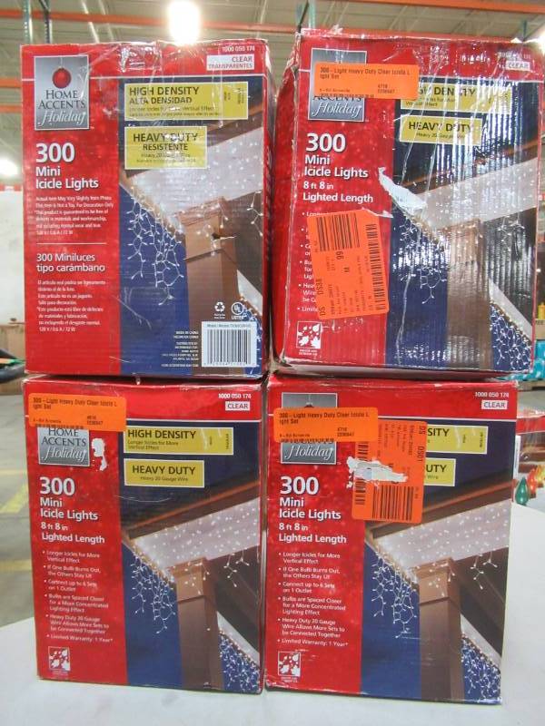 lot 180 image: 4 Boxes of Home Accents Holiday 300-Light Heavy Duty Clear Icicle Light Set, White Cord, TY300CUR-HD