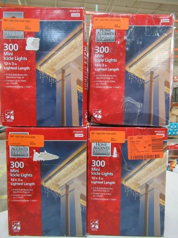 lot 184 image: 4 Boxes of Home Accents Holiday 300-Light Clear Icicle Light Sets, White Cord, TOL-3006WB(C)C