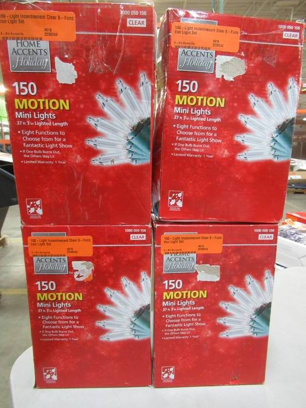 lot 194 image: 4 Boxes of Home Accents Holiday 150-Light Incandescent Clear 8-Function Light Set, TY150L-8FC