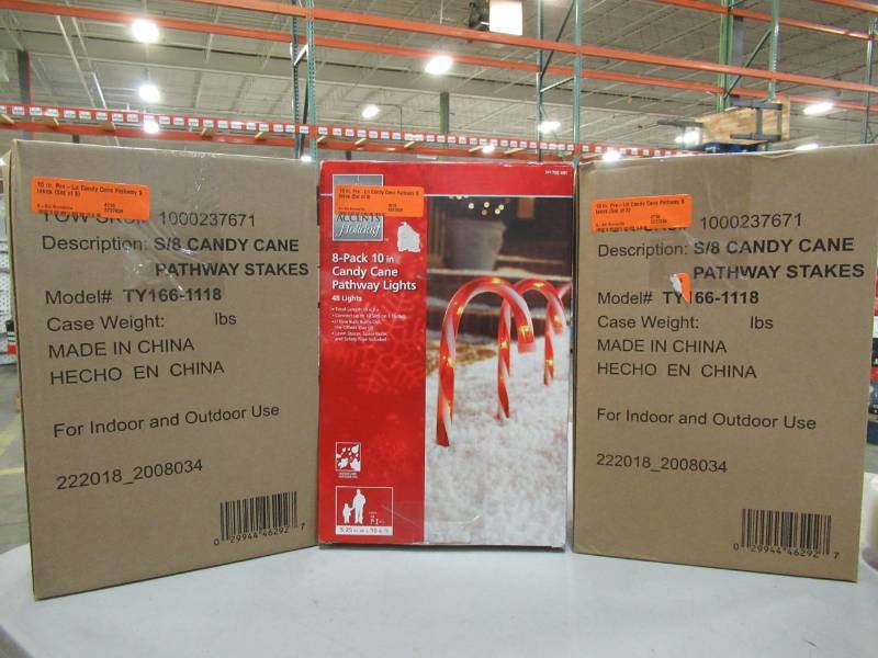 lot 202 image: 3 Boxes of Home Accents Holiday 10 in. Pre-Lit Candy Cane Pathway Stakes (Set of 8), TY166-1118