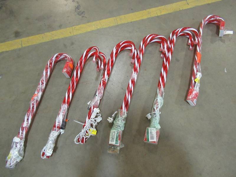 lot 206 image: 6 Sets of 3 Home Accents Holiday Lighted Pathway Candy Canes, 21258-56
