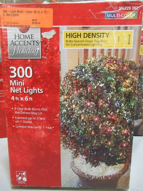 lot 148 image: 4 Boxes of Home Accents Holiday 300-Light Multi-Color 48 in. x 72 in. Net Lights
