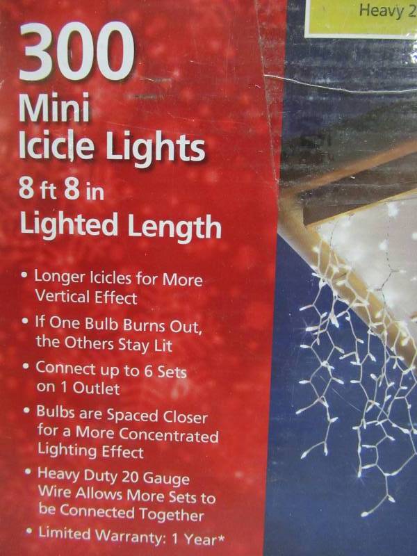 lot 182 image: 4 Boxes of Home Accents Holiday 300-Light Heavy Duty Clear Icicle Light Set, White Cord, TY300CUR-HD
