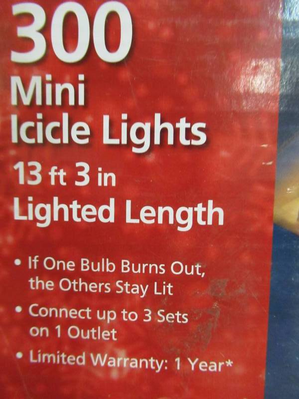 lot 192 image: 4 Boxes of Home Accents Holiday 300-Light Multi-Color Icicle Lights, TOL-3006WB(C)M